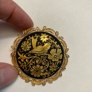 Gold and Black Brooch with Bird and Floral Design